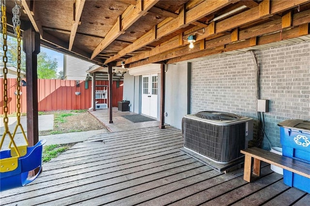 9028 Camille Ave, River Ridge, LA 70123 - wooden terrace featuring central AC unit and fence