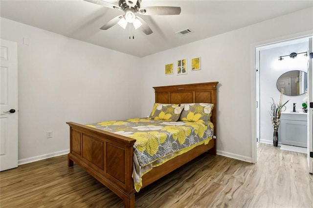 bedroom featuring ceiling fan and wood-type flooring