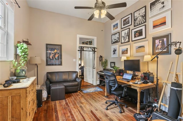 office area featuring wood-type flooring and ceiling fan