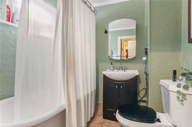 full bathroom with tile patterned flooring, vanity, shower / bath combination with curtain, and toilet