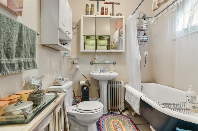 bathroom featuring shower / tub combo, radiator heating unit, tile patterned floors, and toilet