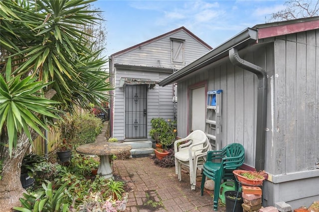 doorway to property with a patio