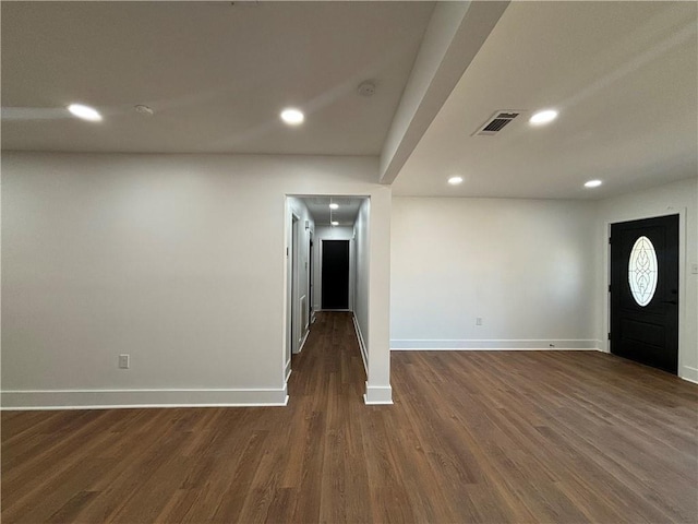 interior space with dark hardwood / wood-style floors