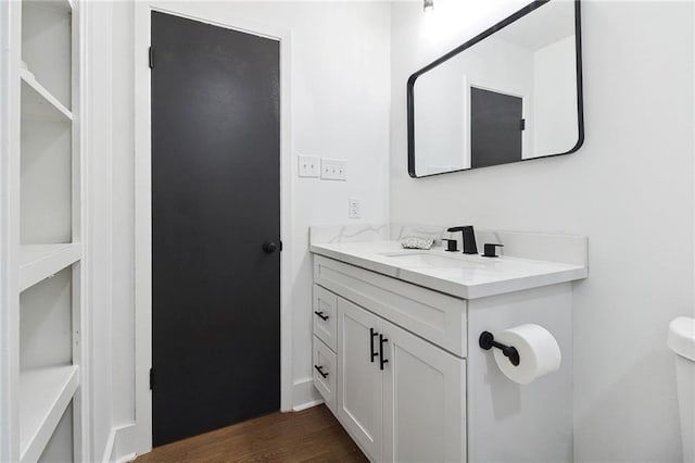 3073 Marydon Dr, Baton Rouge, LA 70814 - half bath featuring toilet, vanity, and wood finished floors