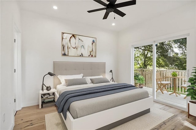 bedroom with ceiling fan, access to exterior, and light hardwood / wood-style floors