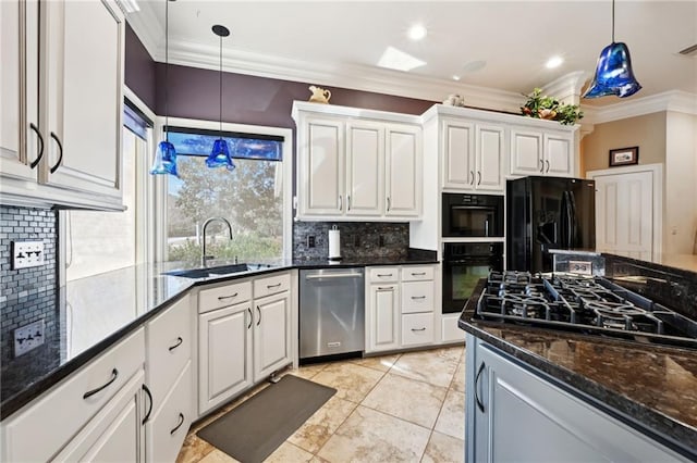 kitchen with white cabinetry, pendant lighting, and black appliances