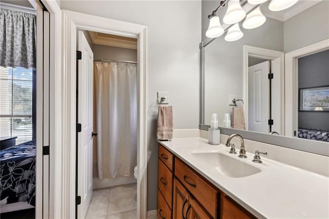 bathroom with vanity, tile patterned floors, and toilet