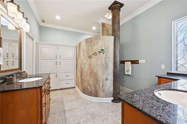 bathroom featuring vanity and crown molding