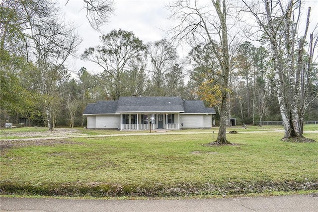 ranch-style house with a front lawn and a porch