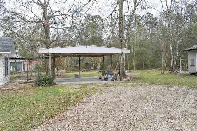 view of yard featuring a carport