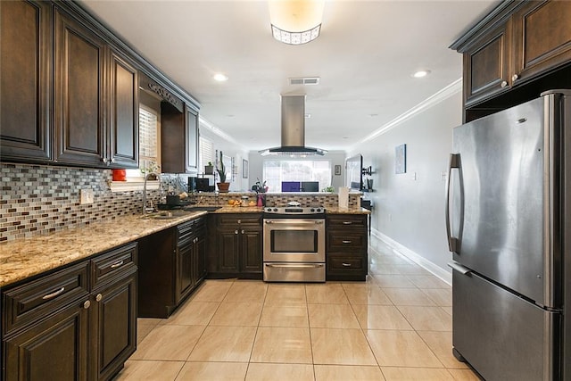 kitchen featuring stainless steel appliances, island exhaust hood, sink, and ornamental molding