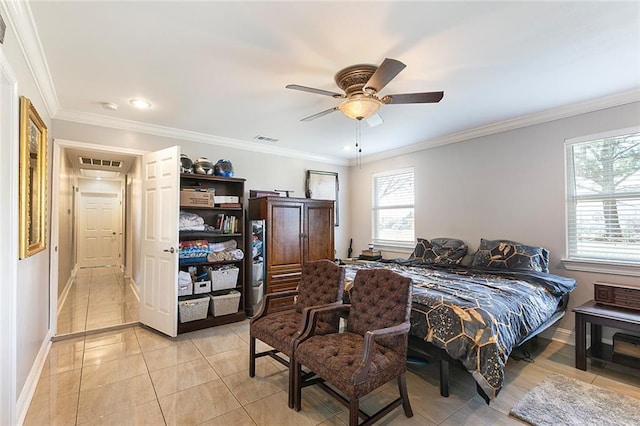 tiled bedroom with crown molding and ceiling fan