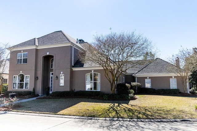 view of front of home with a front yard