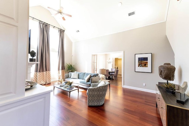 living room with dark wood-type flooring, high vaulted ceiling, and ceiling fan