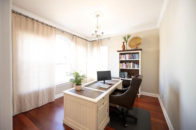 home office featuring dark wood-type flooring, ornamental molding, and an inviting chandelier