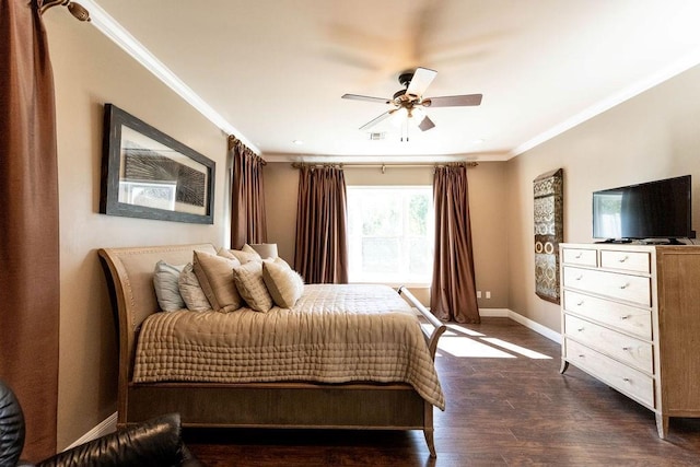 bedroom with crown molding, ceiling fan, and dark hardwood / wood-style flooring