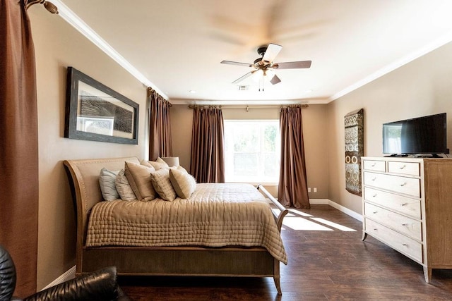 bedroom featuring ornamental molding, dark wood-type flooring, baseboards, and visible vents