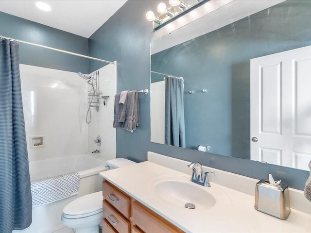 full bathroom with vanity, toilet, and shower / tub combo with curtain