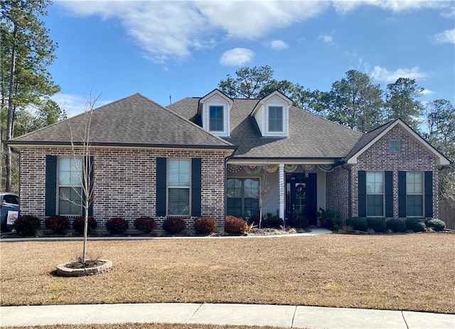 view of front of home with a front yard