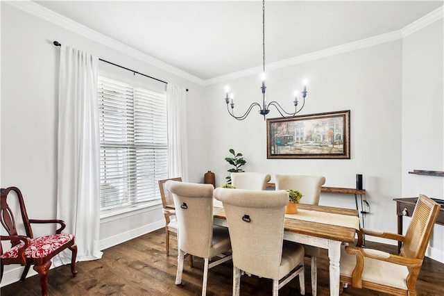 dining space featuring a notable chandelier, crown molding, and dark hardwood / wood-style floors