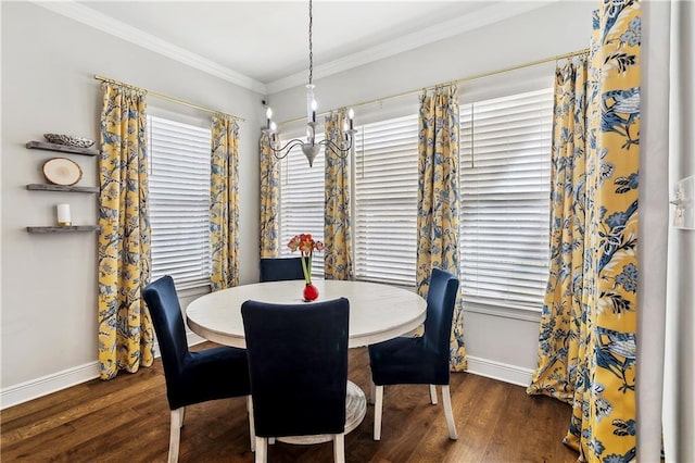 dining space with a notable chandelier, crown molding, and dark wood-type flooring