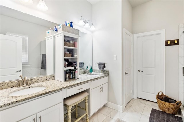 bathroom with vanity and an enclosed shower