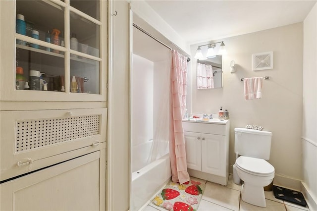 full bathroom with tile patterned flooring, vanity, shower / bath combination with curtain, and toilet