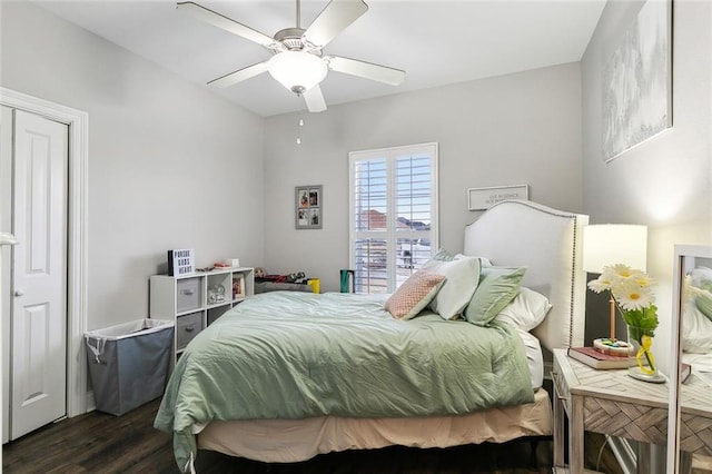 bedroom featuring dark wood-type flooring and ceiling fan