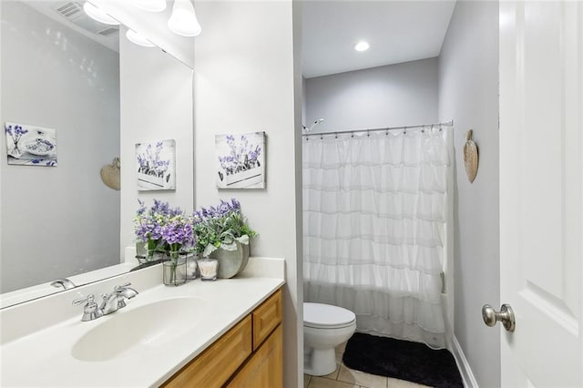 full bathroom featuring shower / bathtub combination with curtain, vanity, tile patterned flooring, and toilet