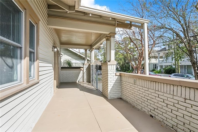 balcony featuring covered porch