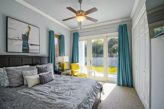 bedroom featuring crown molding, carpet floors, access to exterior, and a closet