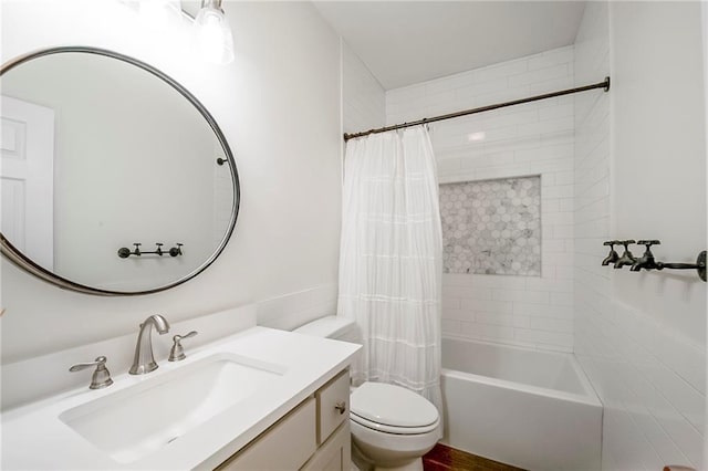 full bathroom featuring vanity, toilet, and shower / bath combo