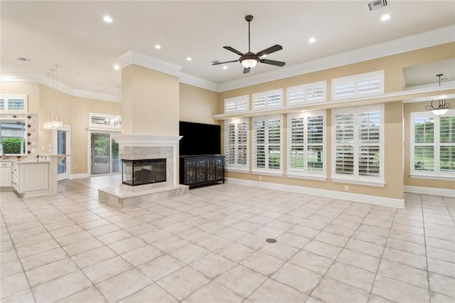 unfurnished living room with crown molding, ceiling fan, and light tile patterned flooring