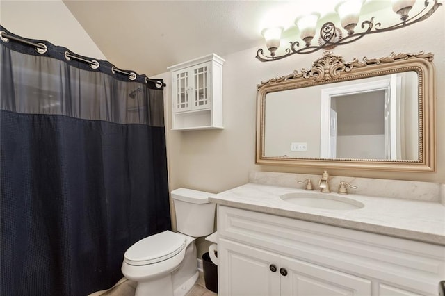 bathroom featuring vanity, a shower with shower curtain, and toilet