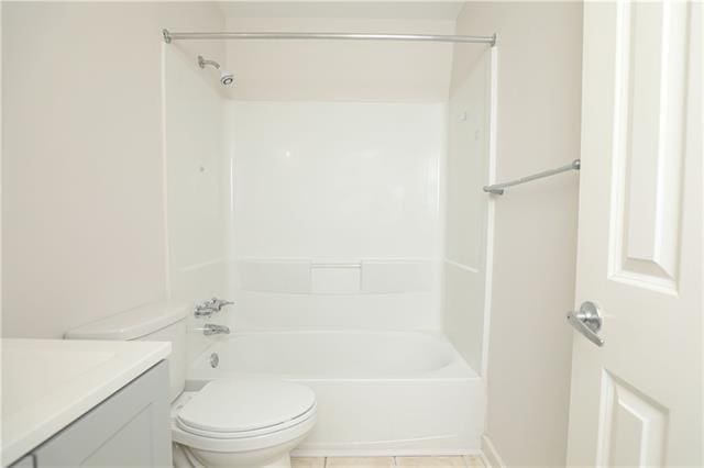 full bathroom with vanity, bathtub / shower combination, and toilet