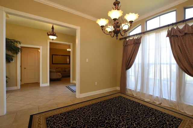 empty room with light tile patterned flooring, crown molding, and an inviting chandelier