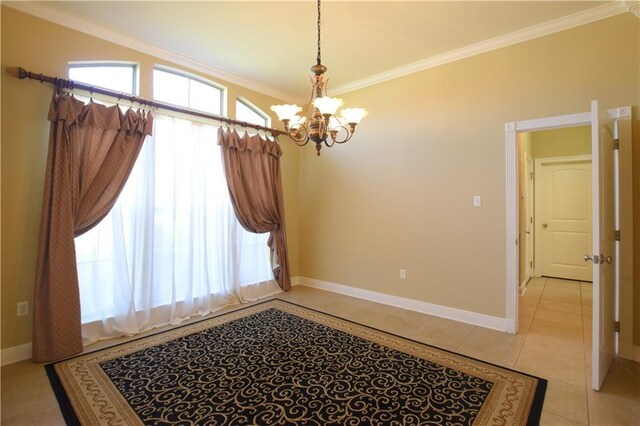 interior space with light tile patterned floors, a wealth of natural light, ornamental molding, and a chandelier