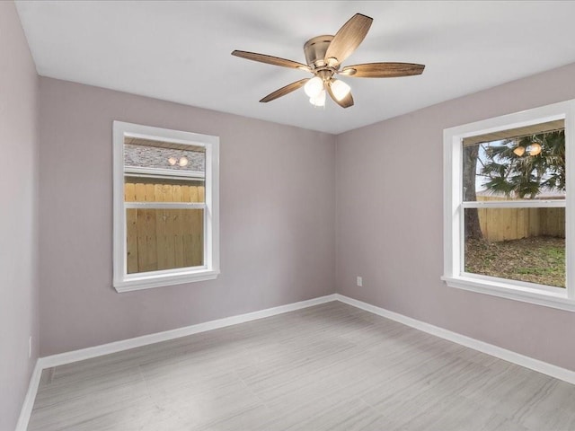 unfurnished room featuring ceiling fan