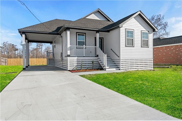 bungalow-style home with a front lawn and covered porch