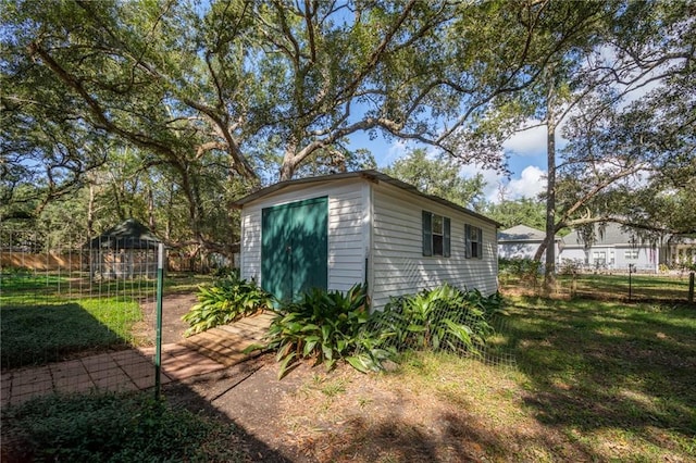 view of outdoor structure featuring a yard