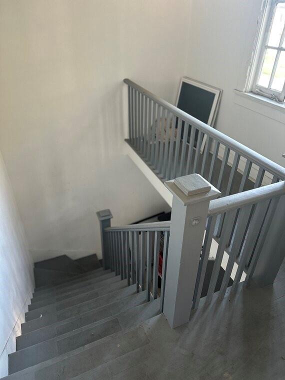 3526 Louisiana Ave Parkway, New Orleans, LA 70125 - stairway with wood-type flooring
