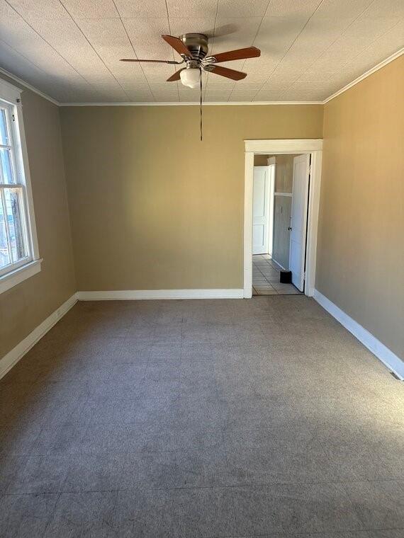 3526 Louisiana Ave Parkway, New Orleans, LA 70125 - unfurnished room with crown molding, ceiling fan, and carpet floors