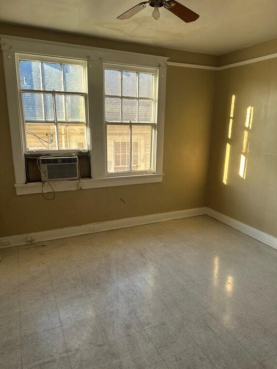 3526 Louisiana Ave Parkway, New Orleans, LA 70125 - empty room with cooling unit and ceiling fan