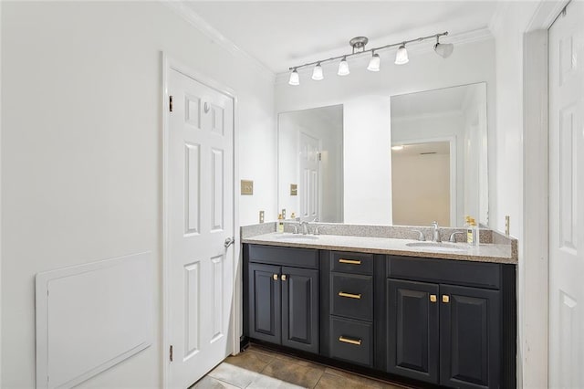 bathroom featuring ornamental molding, rail lighting, tile patterned flooring, and vanity