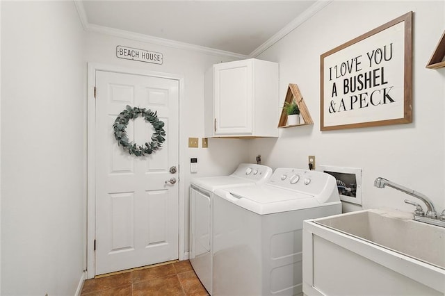 laundry area with cabinets, independent washer and dryer, ornamental molding, and sink