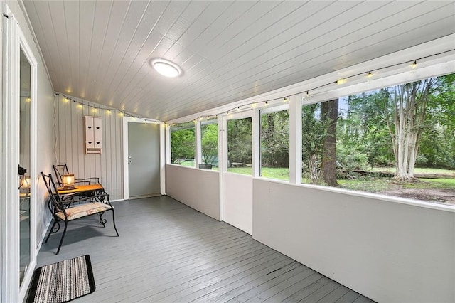 sunroom with wood ceiling