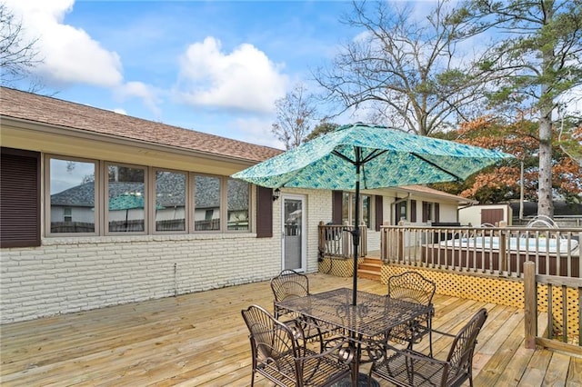 3845 Monroe St, Mandeville, LA 70448 - deck featuring outdoor dining area