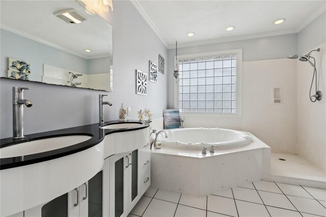 bathroom featuring vanity, crown molding, tile patterned floors, and plus walk in shower