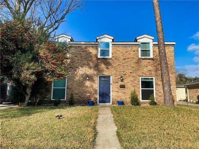 view of front of house with a front yard