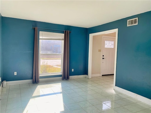 view of tiled empty room